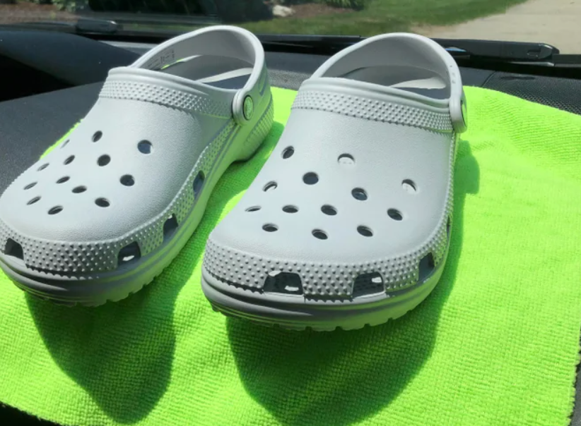 shrinking Crocs by placing them on a car dashboard